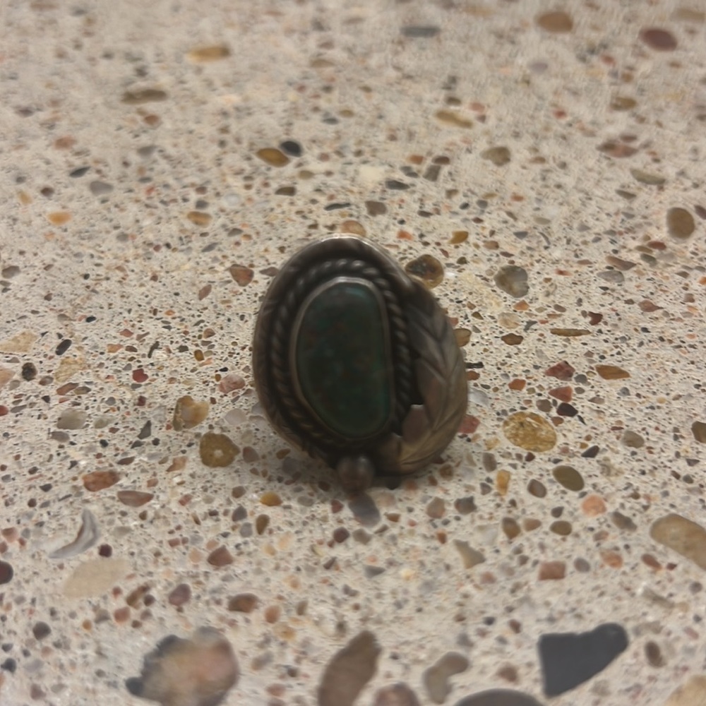 Silver ring with turquoise rock
